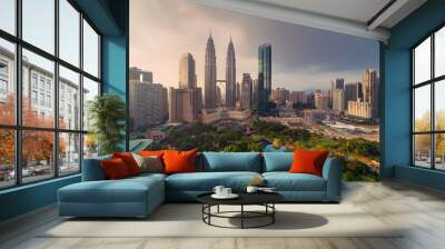 Aerial view of Kuala Lumpur Downtown, Malaysia. Financial district and business centers in smart urban city in Asia. Skyscraper and high-rise buildings at sunset. Wall mural