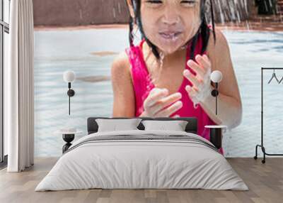 Asian Chinese Little Girl Take A Shower Near The Pool Wall mural