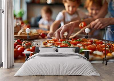 A family is making pizza together in the kitchen Wall mural