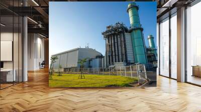 Combine cycle power plant with green field and clear sky Wall mural