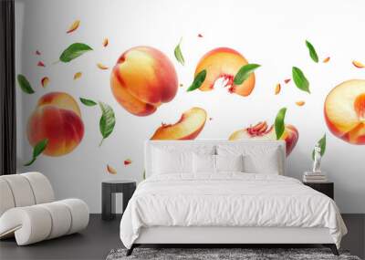 Flying Peach fruit with half slice and green leaves in the air with leaves isolated on background, Delicious fruit in summer season. Wall mural