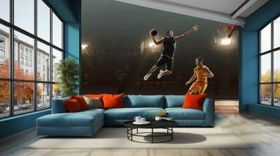 Two basketball players in action fighting for the ball near hoop Wall mural