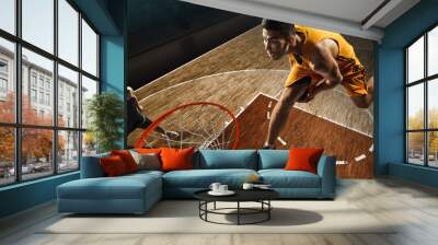 Two basketball players plays near the hoop. High angle view from the basketball rim	 Wall mural