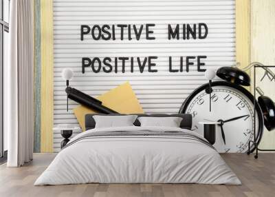 Positive mind, positive life motivational quote on the letter board. Wall mural