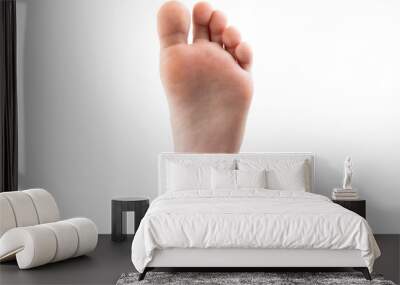 Baby foot isolated on white background. Wall mural