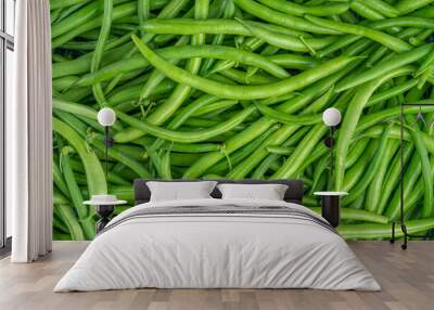 Fresh green bean pods texture. Close up, top view Wall mural