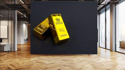 two gold bars on a black Wall mural