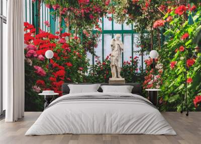 beautiful female statue in colorful blooming orangery. royal greenhouses of laeken in belgium Wall mural