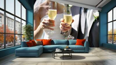 bride and groom making a toast with champagne Wall mural