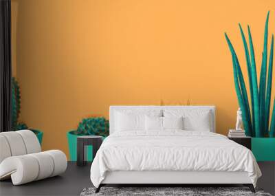 Four different cacti in green pots on pastel terracotta orange background. Environment friendly summer or spring time minimal design concept banner with copy space Wall mural