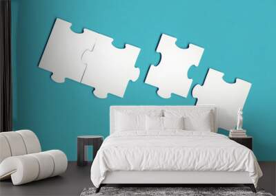 Jigsaw puzzle matching pieces. Teamwork and solution or idea concept with copy space on trendy blue background Wall mural