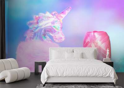 Shiny zine type gradient holographic iridescent head of pink soft fluffy toy unicorn on bright blue pink bokeh fluorescent neon background. Celebration birthday greeting card concept with copy space Wall mural