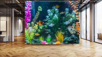 A serene fish tank setup with colorful fish, plants, and decorations. The water is clear, and the scene is calming. Wall mural