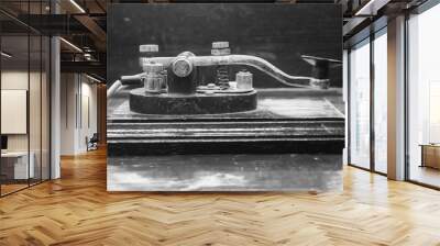 old morse key telegraph on wood table Wall mural