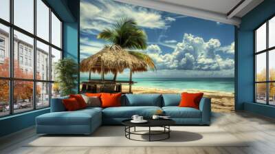 A thatched gazebo stands on a sandy beach, surrounded by palm trees and facing the calm turquoise ocean. Bright clouds fill the blue sky on a sunny day. Wall mural