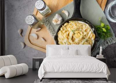 Alfredo pasta dinner with creamy white sauce and herbs Wall mural