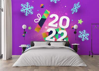 Happy New Year 2022 banner, card, poster, flyer, holiday cover. Modern Xmas design in geometric style with triangle pattern, opened gift box, snowflakes and confetti on bright violet background Wall mural