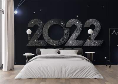 Happy New Year 2022 sparkling design of numbers on dark night sky background with frame made of beautiful fir branches, garlands and shining snow. Horizontal poster, greeting card, header for website Wall mural