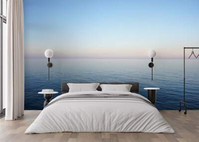 seascape in delicate pastel colors with the horizon of the sea and clear sky early in the morning. m Wall mural