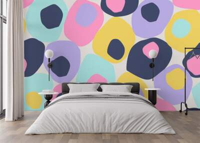 Bold geometric seamless pattern. Colorful dots, blobs, blots, circles cut out background. Wall mural