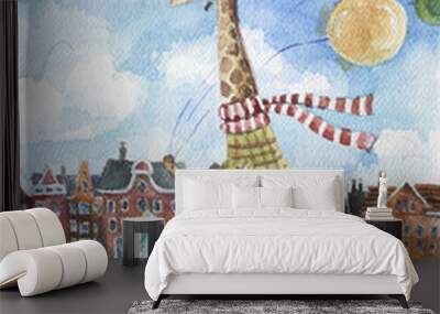 Cute giraffe driving retro scooter holding colorful balloons in one hand on european city landscape background Wall mural