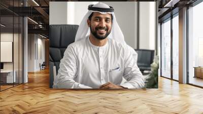 Arab male  portrait businessman in traditional clothes in the office Wall mural