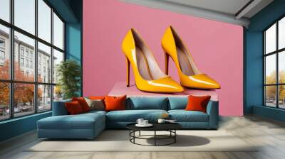 chic yellow patent leather stiletto shoes on a colored background fashionable Wall mural