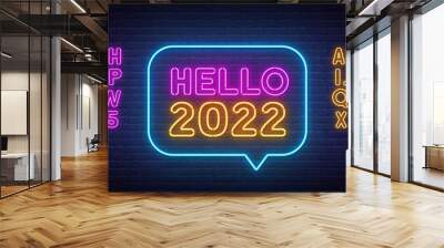 Hello 2022 neon sign on a brick wall background. Wall mural