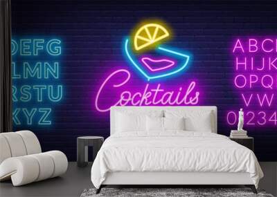 Neon lettering cocktails on brick wall background. Neon fonts. Wall mural