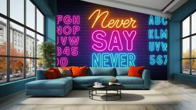 Never Say Never neon quote on a brick wall. Wall mural