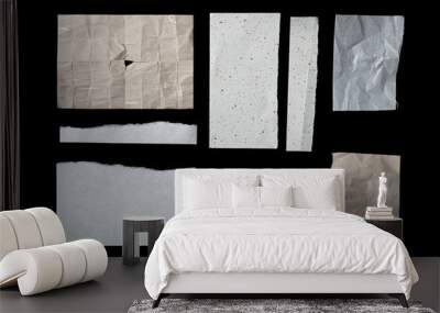 Collection of different torn pieces of paper isolated on black Wall mural