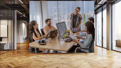 The meeting atmosphere of the business team with Women in business leadership, relaxed style Wall mural