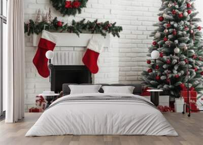 Cozy holiday scene with a decorated tree and warm fireplace for festive cheer Wall mural