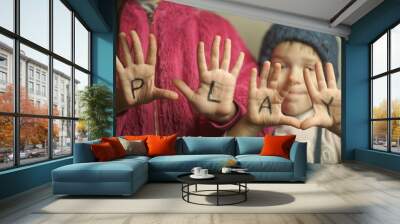 inscription play on the hands of children Wall mural