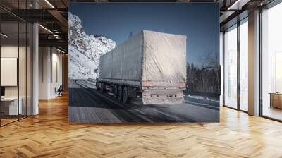 Freight truck on a winter road. Wall mural