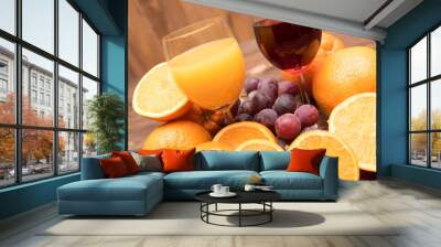 fresh orange and grape juice and fruits Wall mural