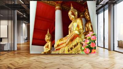 gold buddha image statue at temple Wall mural