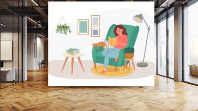 Woman reading book at home sit in chair Wall mural