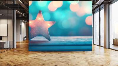 A sparkling star light sits on a wooden background, surrounded by soft bokeh, creating a warm, festive atmosphere for celebrations Wall mural