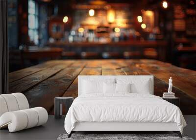 An empty wooden table in a cozy pub, with a warm and inviting atmosphere, perfect for social gatherings. Wall mural