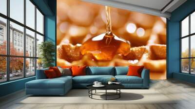 Golden waffles are generously coated with warm maple syrup, creating an inviting and delicious breakfast treat Wall mural