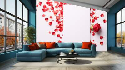 White card mockup with red roses and petals on light table. Top view Wall mural