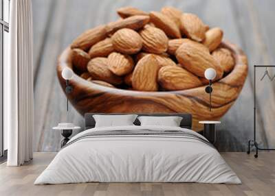 Almonds in a wooden bowl Wall mural