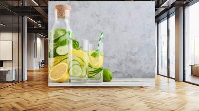 Bottle and two glasses with infused water Wall mural