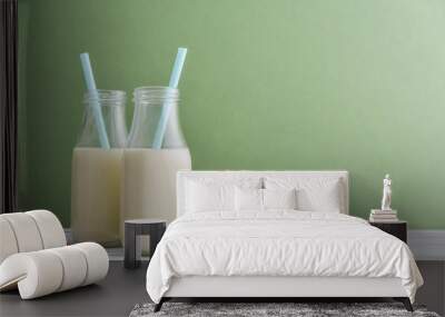 Two bottles vegetarian almond milk Wall mural