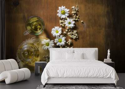 Food background with different black and green dry tea, rose buds cup of hot tea Wall mural