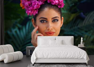 Tropical mystery. Portrait of an exotic beauty in tropical surroundings. Wall mural