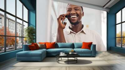 Yes, thats a deal. Shot of a young businessman talking on a cellphone in an office. Wall mural