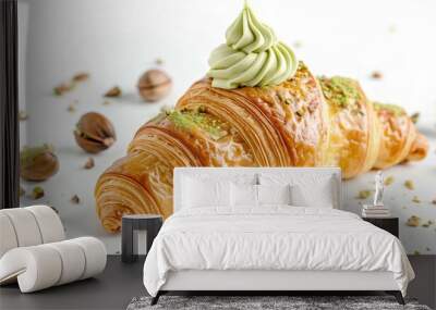 Appetizing fresh croissant filled with pistachio cream and nuts, on white background. Wall mural