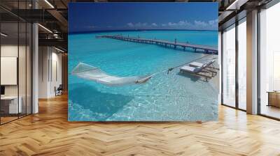 A beach with a white parasol hanging in the water Wall mural